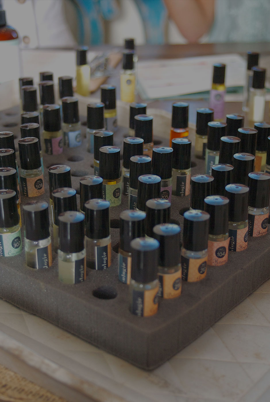 A colorful tray of bathologie scented oils.